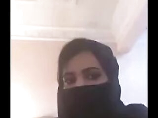 arab damsel demonstrating orbs on webcam